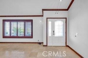 25152 Mammoth Cir, Lake Forest, CA 92630 - foyer with baseboards and crown molding