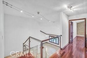 25152 Mammoth Cir, Lake Forest, CA 92630 - corridor featuring wood finished floors and baseboards