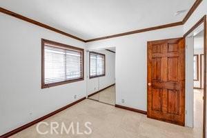 25152 Mammoth Cir, Lake Forest, CA 92630 - unfurnished bedroom with ornamental molding and baseboards