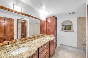 25152 Mammoth Cir, Lake Forest, CA 92630 - bathroom with double vanity and a shower