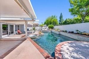 25152 Mammoth Cir, Lake Forest, CA 92630 - view of pool with a patio and a fenced backyard