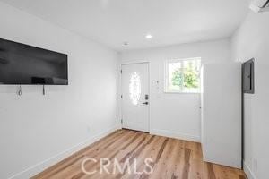 25152 Mammoth Cir, Lake Forest, CA 92630 - foyer entrance with wood finished floors and recessed lighting