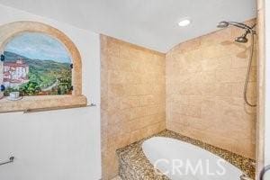 25152 Mammoth Cir, Lake Forest, CA 92630 - bathroom featuring tiled tub, tiled shower, and recessed lighting