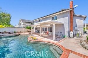 25152 Mammoth Cir, Lake Forest, CA 92630 - view of swimming pool with a patio area