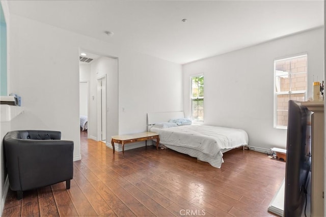 1335 Mc Fadden Dr, Fullerton, CA 92833 - bedroom featuring wood-type flooring and baseboards