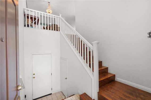 1335 Mc Fadden Dr, Fullerton, CA 92833 - staircase featuring baseboards