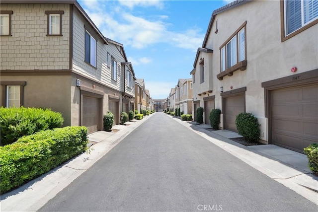 1335 Mc Fadden Dr, Fullerton, CA 92833 - view of asphalt road with a residential view