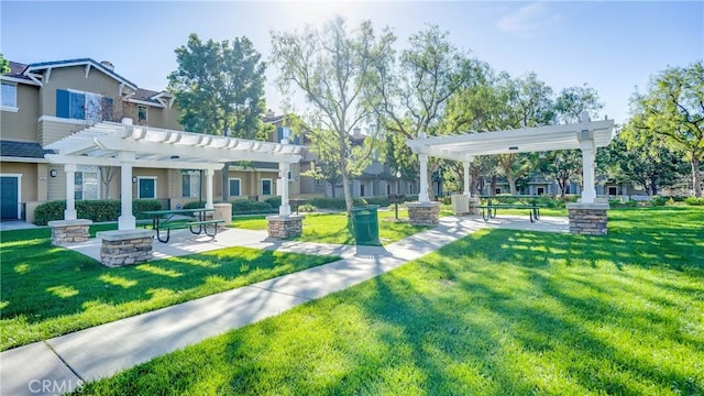 1335 Mc Fadden Dr, Fullerton, CA 92833 - surrounding community featuring a pergola and a yard