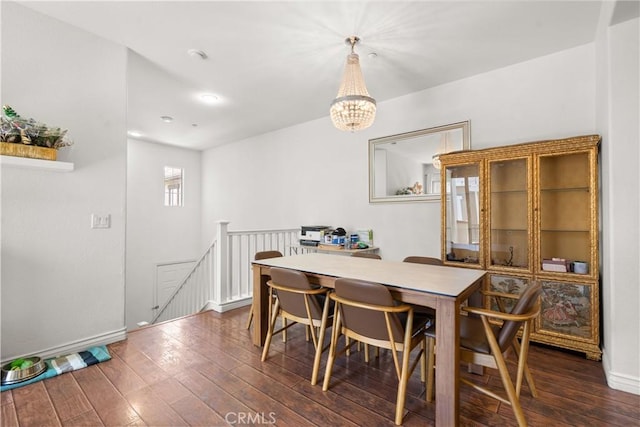 1335 Mc Fadden Dr, Fullerton, CA 92833 - dining space featuring a chandelier and dark wood-type flooring