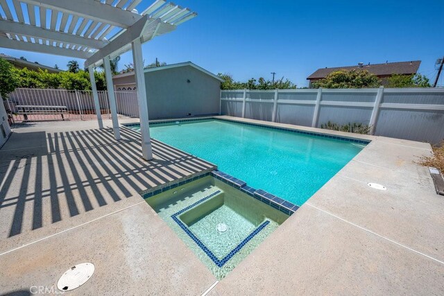 11009 Quill Ave, Sunland, CA 91040 - view of swimming pool with a pool with connected hot tub, a pergola, and a patio area