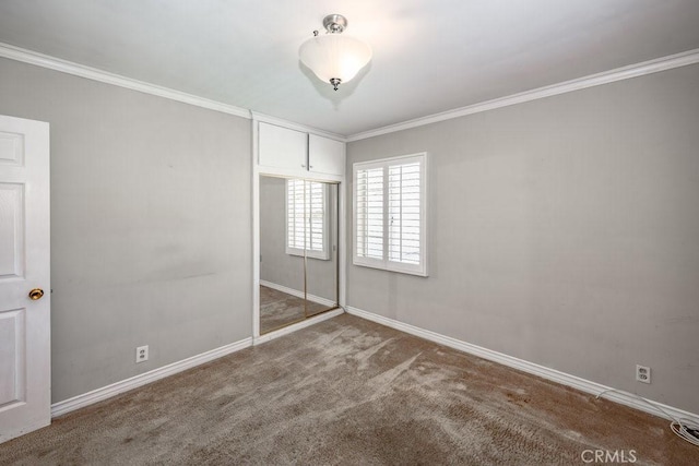 11009 Quill Ave, Sunland, CA 91040 - unfurnished bedroom with carpet floors, a closet, and ornamental molding