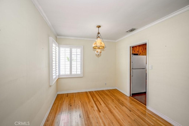 11009 Quill Ave, Sunland, CA 91040 - empty room featuring light wood finished floors and crown molding