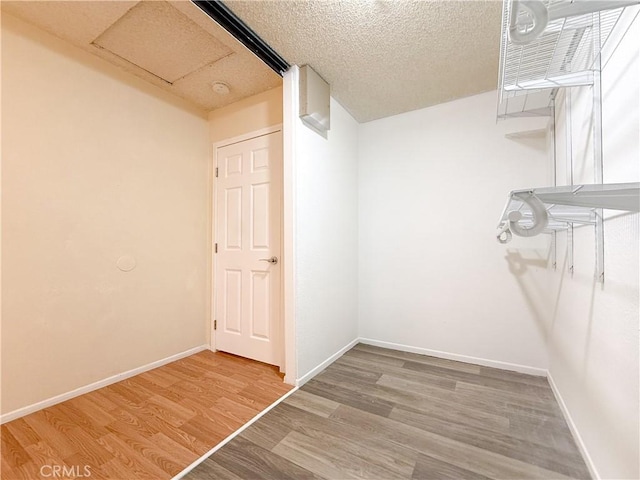 12967 Side Saddle Rd, Victorville, CA 92392 - walk in closet with wood finished floors