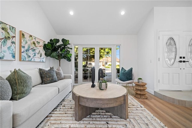 24861 Camberwell St, Laguna Hills, CA 92653 - living area with vaulted ceiling, french doors, wood finished floors, and recessed lighting