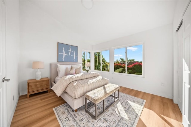 24861 Camberwell St, Laguna Hills, CA 92653 - bedroom featuring light wood-type flooring and baseboards