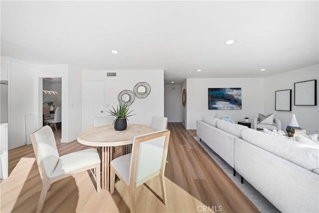 24861 Camberwell St, Laguna Hills, CA 92653 - dining area with light wood-type flooring and recessed lighting