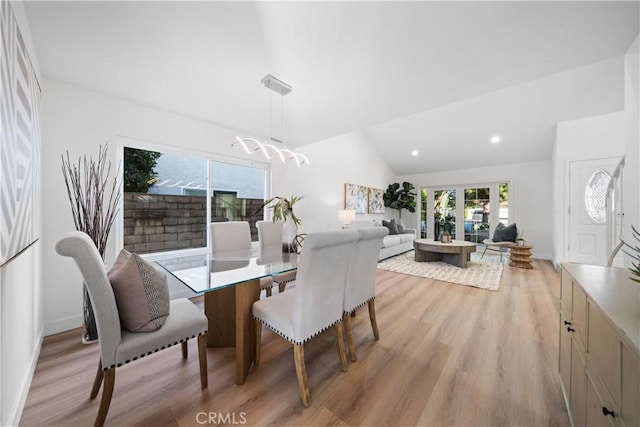 24861 Camberwell St, Laguna Hills, CA 92653 - dining room with light wood-style floors, vaulted ceiling, a chandelier, and recessed lighting