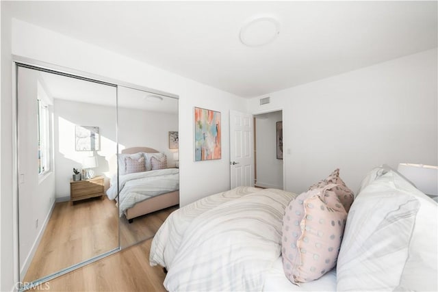 24861 Camberwell St, Laguna Hills, CA 92653 - bedroom featuring wood finished floors and a closet