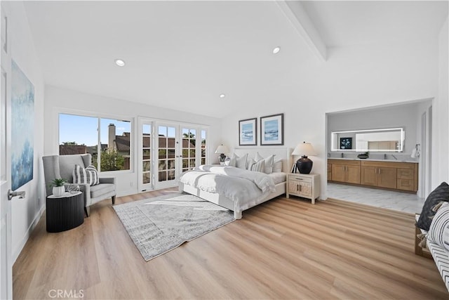 24861 Camberwell St, Laguna Hills, CA 92653 - bedroom with french doors, light wood-style floors, beam ceiling, high vaulted ceiling, and connected bathroom
