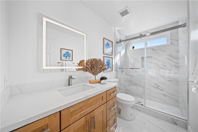 24861 Camberwell St, Laguna Hills, CA 92653 - bathroom with vanity, a marble finish shower, and marble look tiles