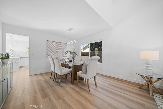 24861 Camberwell St, Laguna Hills, CA 92653 - dining space with light wood finished floors and a chandelier