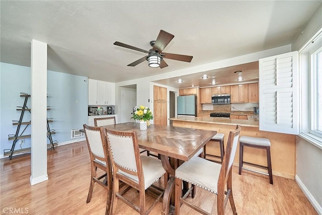 2424 S Gaffey St Unit 101, San Pedro, CA 90731 - dining area featuring light wood finished floors and a ceiling fan