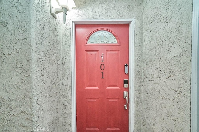 2424 S Gaffey St Unit 101, San Pedro, CA 90731 - doorway to property with stucco siding