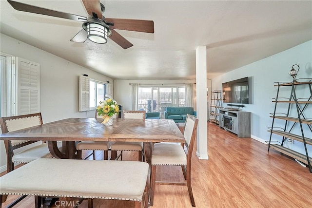2424 S Gaffey St Unit 101, San Pedro, CA 90731 - dining area with ceiling fan and light wood finished floors
