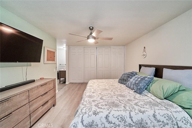 2424 S Gaffey St Unit 101, San Pedro, CA 90731 - bedroom featuring light wood-type flooring, a closet, and a ceiling fan