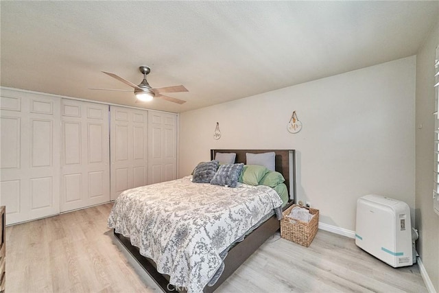 2424 S Gaffey St Unit 101, San Pedro, CA 90731 - bedroom with a closet, light wood-style flooring, and ceiling fan