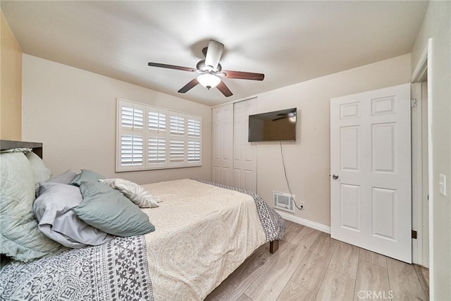 2424 S Gaffey St Unit 101, San Pedro, CA 90731 - bedroom featuring light wood-style flooring, a closet, and ceiling fan