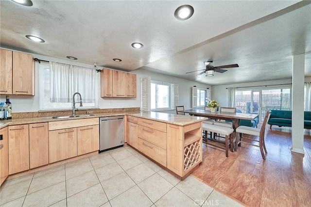 2424 S Gaffey St Unit 101, San Pedro, CA 90731 - kitchen with stainless steel dishwasher, light brown cabinetry, a peninsula, plenty of natural light, and recessed lighting