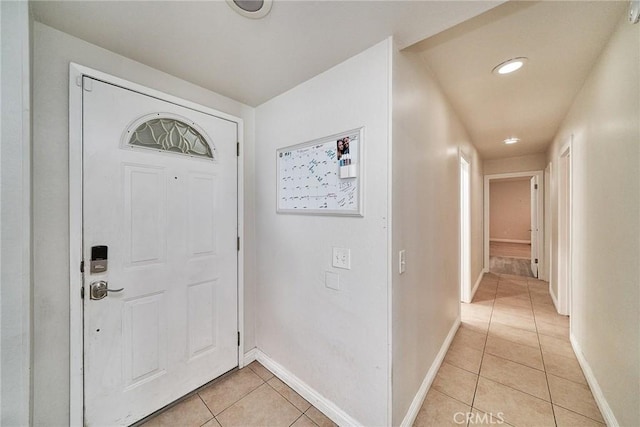 2424 S Gaffey St Unit 101, San Pedro, CA 90731 - entrance foyer with light tile patterned flooring and recessed lighting