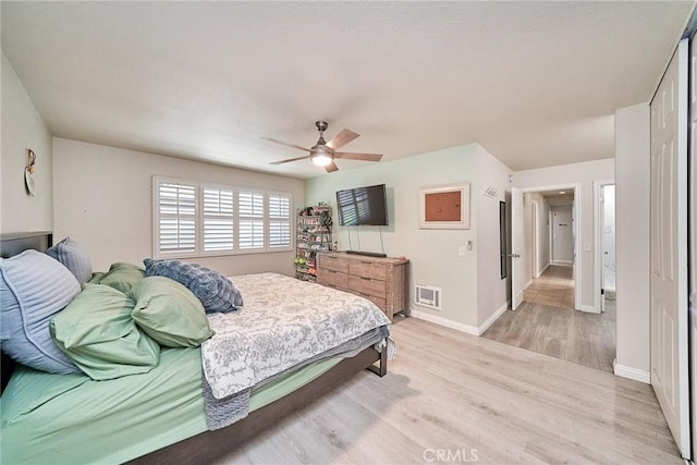 2424 S Gaffey St Unit 101, San Pedro, CA 90731 - bedroom with light wood-style flooring and a ceiling fan