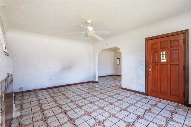 2439 California St, Walnut Park, CA 90255 - entrance foyer with arched walkways and ceiling fan