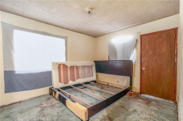 2439 California St, Walnut Park, CA 90255 - bedroom with a textured ceiling