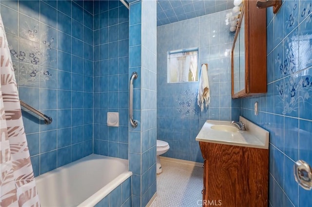 2439 California St, Walnut Park, CA 90255 - full bathroom with tile walls, vanity, tiled shower / bath combo, and tile patterned flooring