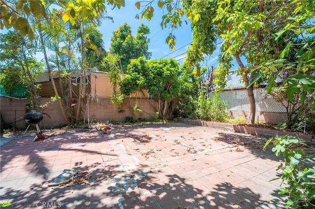 2439 California St, Walnut Park, CA 90255 - fenced backyard featuring a patio