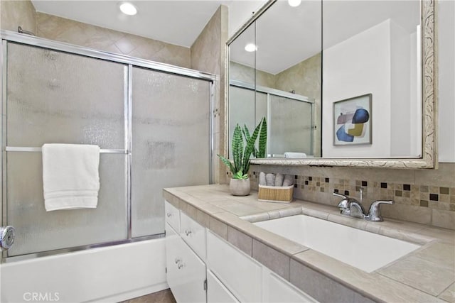 545 Chestnut Ave Unit 411, Long Beach, CA 90802 - full bathroom featuring vanity, combined bath / shower with glass door, and recessed lighting