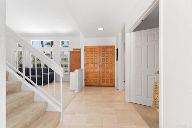 4356 Point Reyes Ct, Carlsbad, CA 92010 - foyer with stairs and light tile patterned floors