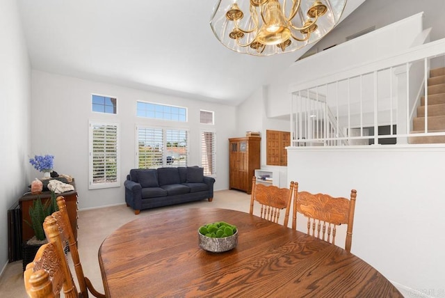 4356 Point Reyes Ct, Carlsbad, CA 92010 - carpeted dining area featuring high vaulted ceiling, stairway, and a chandelier