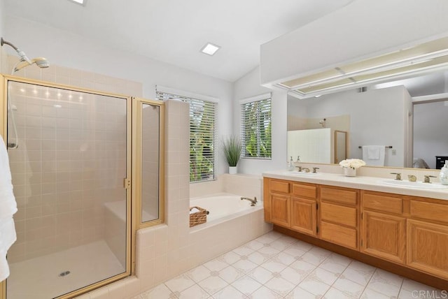 4356 Point Reyes Ct, Carlsbad, CA 92010 - bathroom featuring a stall shower, a garden tub, double vanity, and vaulted ceiling