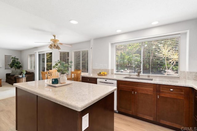 4356 Point Reyes Ct, Carlsbad, CA 92010 - kitchen featuring dishwasher, light wood finished floors, ceiling fan, a kitchen island, and recessed lighting