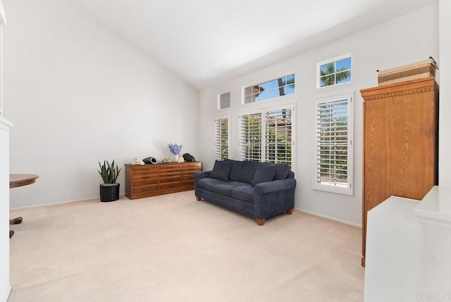 4356 Point Reyes Ct, Carlsbad, CA 92010 - sitting room with light carpet and high vaulted ceiling