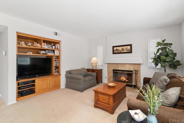 4356 Point Reyes Ct, Carlsbad, CA 92010 - living room featuring a tiled fireplace and light colored carpet