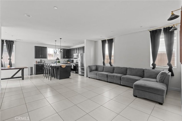 4443 Manzanita St, Guadalupe, CA 93434 - living area featuring light tile patterned flooring and recessed lighting