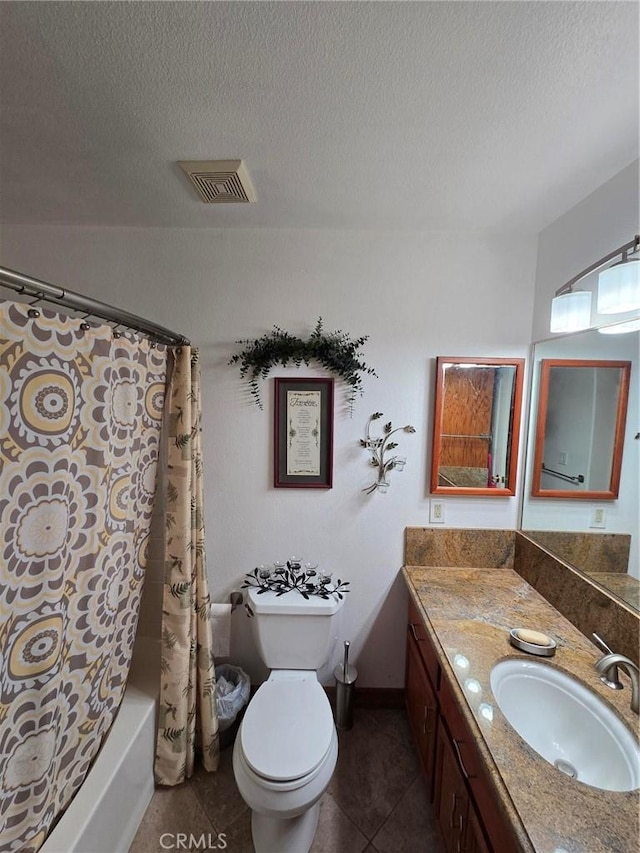 7050 Ivanpah Ave Unit 29, Palms, CA 92277 - bathroom with vanity, shower / bathtub combination with curtain, tile patterned flooring, and a textured ceiling