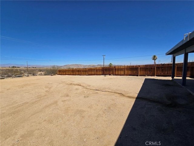 7050 Ivanpah Ave Unit 29, Palms, CA 92277 - view of yard featuring a mountain view and a patio