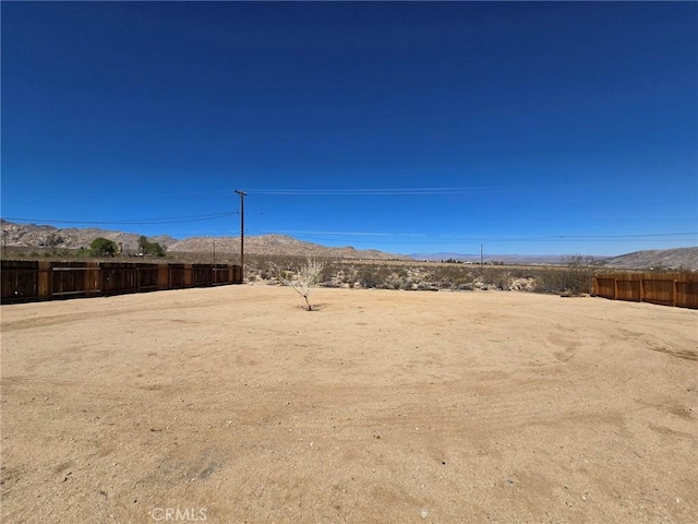 7050 Ivanpah Ave Unit 29, Palms, CA 92277 - view of yard with a mountain view