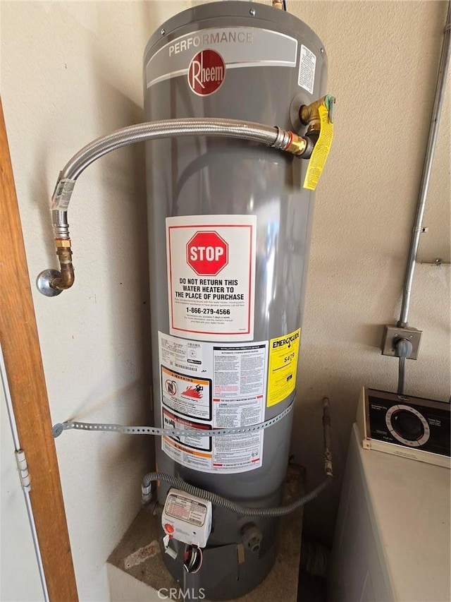 7050 Ivanpah Ave Unit 29, Palms, CA 92277 - utility room with secured water heater